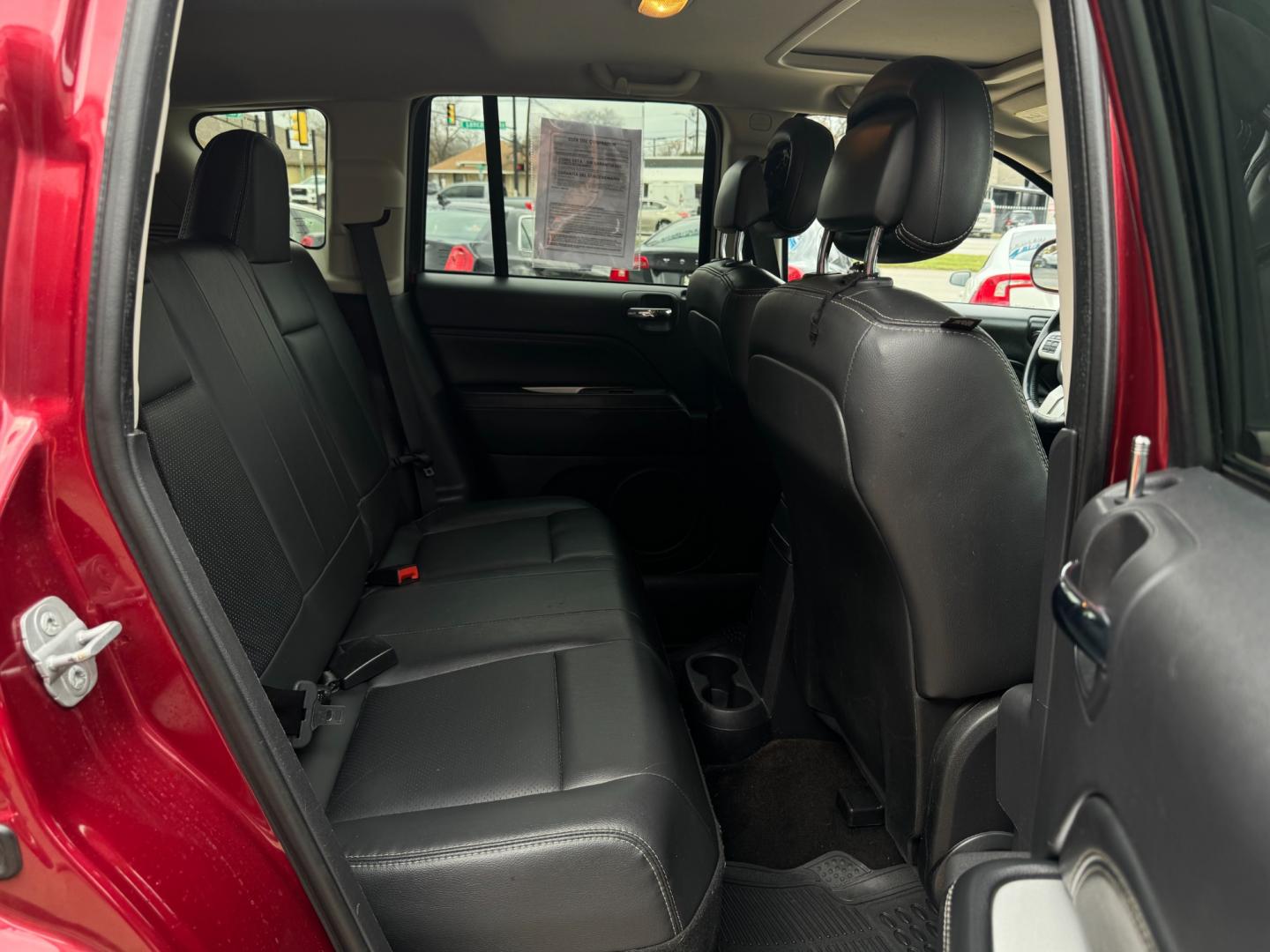 2014 RED /Black JEEP COMPASS LATITUDE Latitude 4dr SUV (1C4NJCEA3ED) with an 2.0L I4 engine, CVT transmission, located at 5900 E. Lancaster Ave., Fort Worth, TX, 76112, (817) 457-5456, 0.000000, 0.000000 - This is a 2014 JEEP COMPASS Latitude 4 DR SUV that is in excellent condition. The interior is clean with no rips or tears or stains. All power windows, door locks and seats. Ice cold AC for those hot Texas summer days. It is equipped with an AM/FM radio, AUX port, Bluetooth connectivity and Sirius X - Photo#13